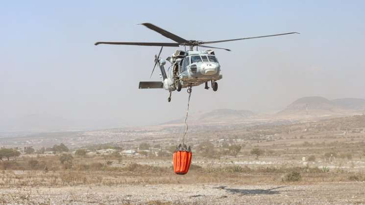   Suman dos helicópteros al combate del incendio en Tepelmeme   